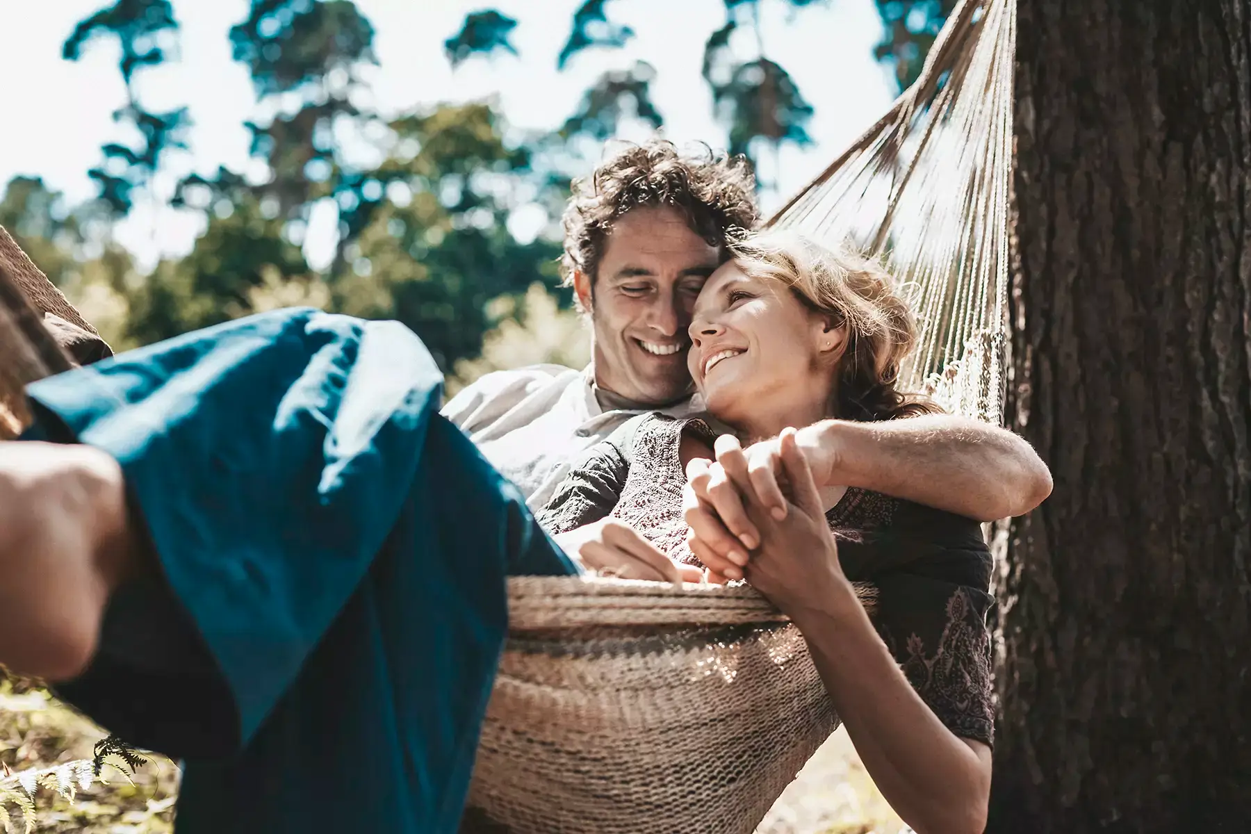 Retirement couple enjoy time together in a hammock - Via Wealth